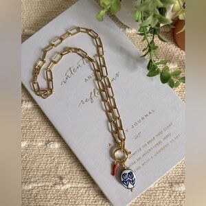 Gold tone necklace and pendant